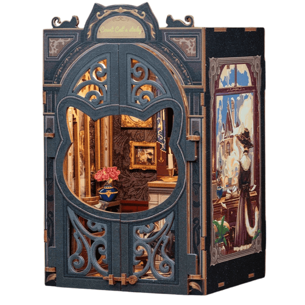 Handcrafted book nook kit with ornate cat-shaped window, miniature study, and detailed decor