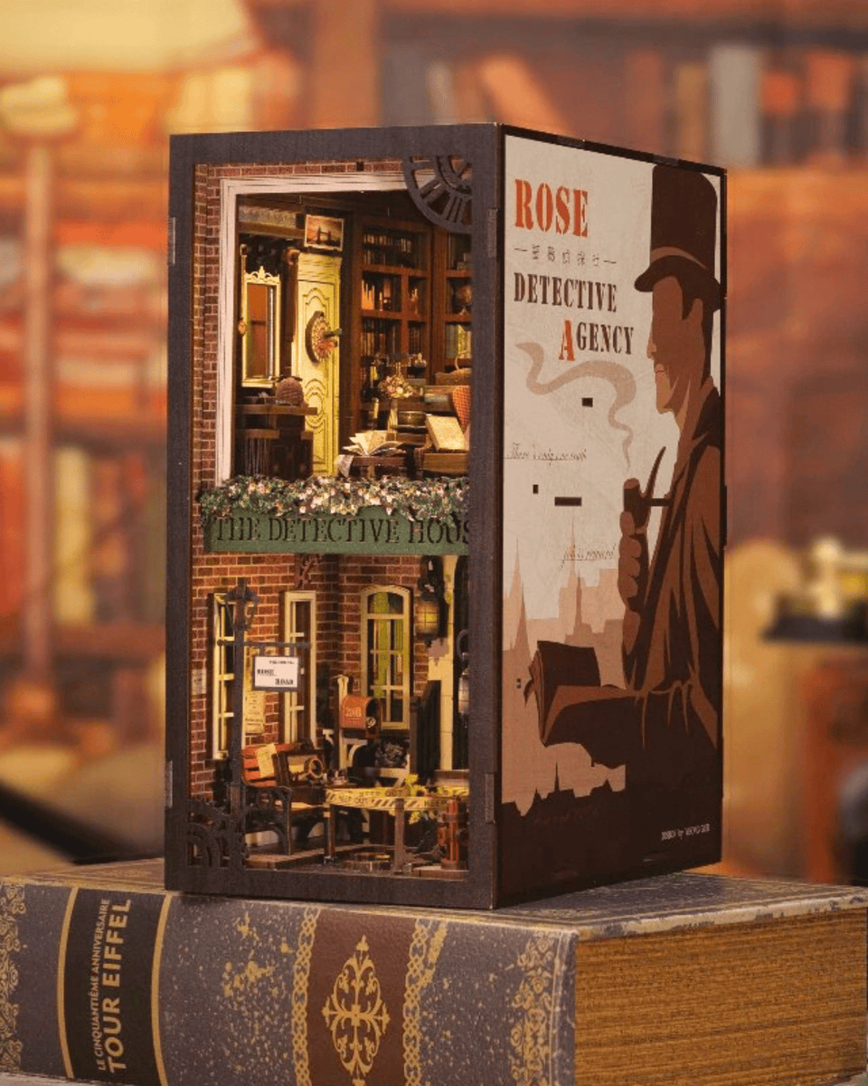 Detective agency book nook kit with miniature office scene, bookshelf, and LED lighting