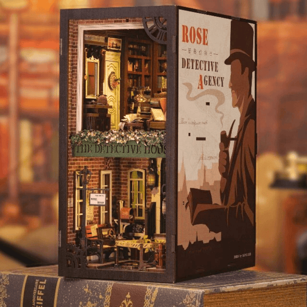 Detective agency book nook kit with miniature office scene, bookshelf, and LED lighting